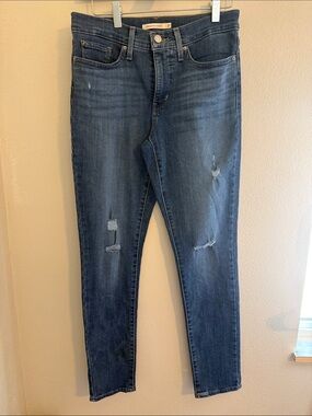 24. Women’s Levi - 311 Shaping Skinny - 27